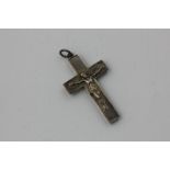 A silver crucifix pendant