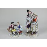 A 20th century Rudolstadt Volkstedt porcelain figure group of an admiral and a young woman, 21cm