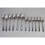 A set of six Edward VII silver teaspoons with bright cut borders, maker Walker & Hall, Chester 1906,