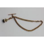 A 9ct gold watch chain with 'T' bar, swivels and a hardstone fob seal, 25.5g gross