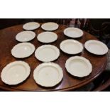 A collection of Leeds Pottery and other creamware tableware, to include plates and bowls with raised