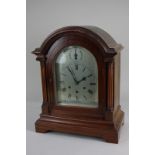 A Westminster chiming mantel clock with 15cm steel dial and chime / silent dial, in domed case