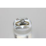 An old cut diamond ring six claw set in white and yellow gold
