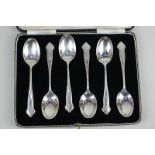 A cased set of six George VI silver teaspoons, shaped handles with engraved initials, maker Cooper