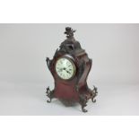 A 19th century French gilt metal mounted red tortoiseshell mantel clock with 11cm white enamel