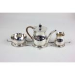 A Victorian silver bachelor's three-piece tea set, makers Hukin & Heath, London 1898, together