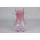 A Victorian glass two-handled vase in graduated pale pink, rough pontil mark to base, 18.5cm