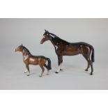 A Beswick model of a racehorse, brown gloss, 20cm, and a pony, 13.5cm