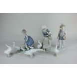 Five Lladro porcelain figures of a girl herding geese, a boy with fishing pole, a girl holding a