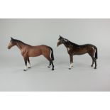 Two Beswick models of race horses, in brown gloss, 22cm, and matte, 21cm