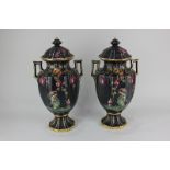 A pair of Edwardian two handled vases and covers, with glazed decoration depicting a woman and child