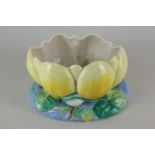 A Clarice Cliff Newport pottery flower shaped bowl in the form of a yellow water lily, 12cm high