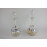 A pair of 19th century Austrian glass spirit decanters of globular form, the floral design marked