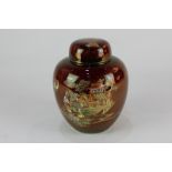 A Carlton ware rouge royale jar and cover depicting two figures in Chinese landscape