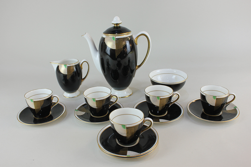 An Art Deco Royal Doulton porcelain part coffee set in Tango pattern, comprising coffee pot (a/f),