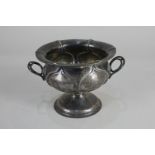 A Russian 84 zolotniks silver pedestal twin-handled sugar bowl, baluster form with embossed lobes,