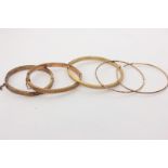 Five various gold bangles, 28.8g, (a/f)