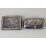 An Indian white metal and niello trinket box depicting a stag and doe, with city scape on verso,