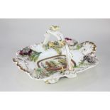 A Coalbrookdale floral encrusted porcelain basket, rectangular shape with central lakeside view,