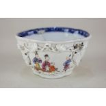 A Chinese porcelain libation cup, oval form with opposing panels of figures, with raised scroll