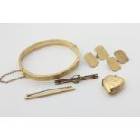 A 9ct gold bangle, a pair of 9ct gold cufflinks, two bar brooches, and a gold cased locket