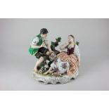 A German porcelain figure group of two lovers, by Rudolph Kammer, 23cm high