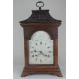 A 19th century Chinese Chippendale mahogany bracket clock with 7 inch silvered metal break arch,