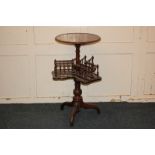 A Victorian mahogany drawing room table with circular top above burr wood book stand with turned