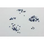 Five boxes of small faceted unmounted sapphires