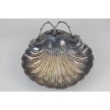A Mappin & Webb silver plated scallop shell-shaped serving dish with naturalistic handle cast with