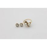 A cultured pearl crossover ring in 18ct gold, and a pair of opal ear studs