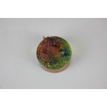 A modern coloured glass paperweight with water dragon raised relief, signature to base Kobbe (?),