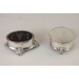 A George V silver and tortoiseshell oval dressing table box, marks worn, Birmingham 1910, together