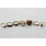 Seven gold rings variously gem set