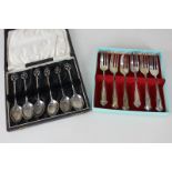 A set of six George V cased silver coffee spoons with pierced heart shape terminals, maker Docker