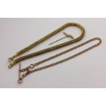 A 9ct gold curb link watch chain with 'T' bar and swivel, 30.9g, a gilt metal neck chain, and a