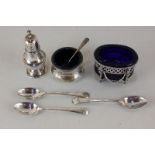 A George V silver pepperette, baluster shape, and a circular salt cruet with blue liner, Chester