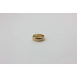 An 18ct yellow gold wedding ring, 5.8g