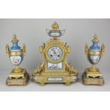 A French gilt metal and porcelain mantel clock, the movement striking on a bell stamped Gay Vicarino