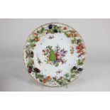 A Dresden porcelain cabinet plate decorated with applied fruits, foliage, blossom and insects,