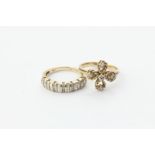 A diamond ring of ropework quatrefoil design set with five diamonds in 9ct yellow gold, a diamond