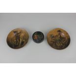 A pair of Victorian papier mache dishes depicting a knight and a lady mounted on white horses,