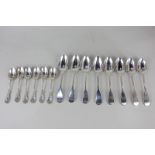 A matched set of eight Victorian Scottish silver fiddle pattern dessert spoons, makers Robert Gray &