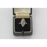 An old cut diamond ring, navette shaped with split shoulders