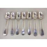 Four George IV and later silver fiddle pattern dessert spoons, makers George Wintle 1822, William