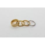 Two 22ct gold rings, 6.7g, an 18ct gold ring, 7.1g, and a platinum ring, 3g