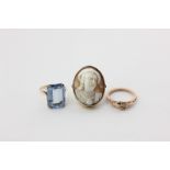 A shell cameo ring in 9ct gold, a gold 'Febe' ring, and a blue topaz ring in 9ct gold