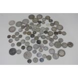A collection of George III to George V coinage, including threepenny bits, sixpences, florins,