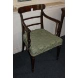 An early 19th century mahogany elbow chair, bar back with fluted arms, on tapered legs (a/f)