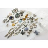 A collection of silver earrings and miscellaneous items of silver and base metal jewellery